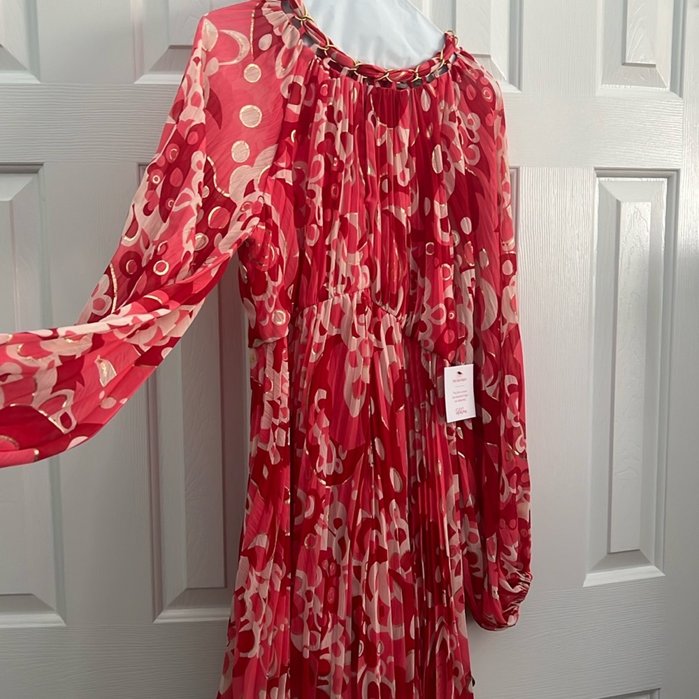 Seventies’ style dress with zip back and bell sleeves